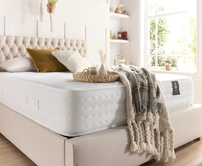A mattress on a bed

Description automatically generated