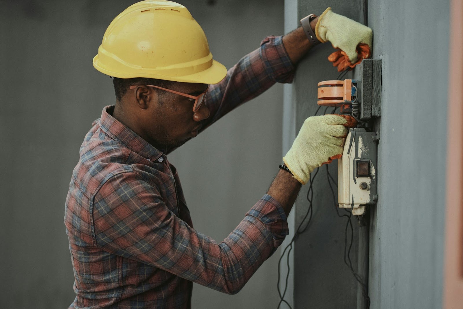 A construction worker handling tools.