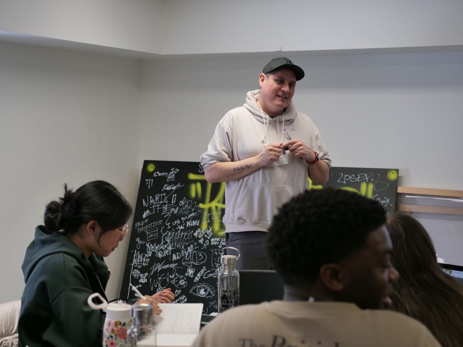 Tyler Pennock leads a writing workshop for FutureVersers and Finalists at the SAW Centre.