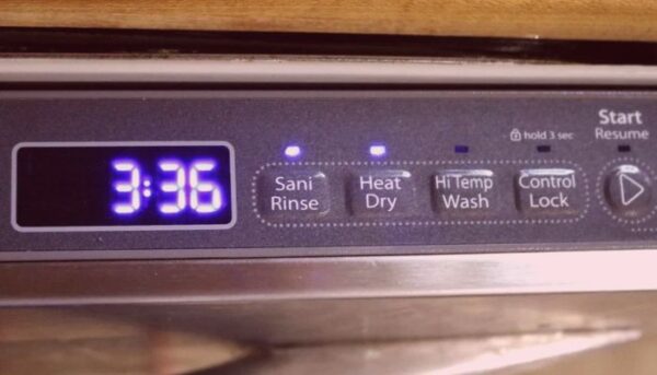 High temp and heated dry button on the control panel.