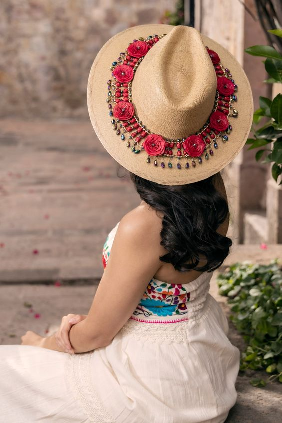 Picture showing a lady wearing a beach dress and rocking the fashion accessory 