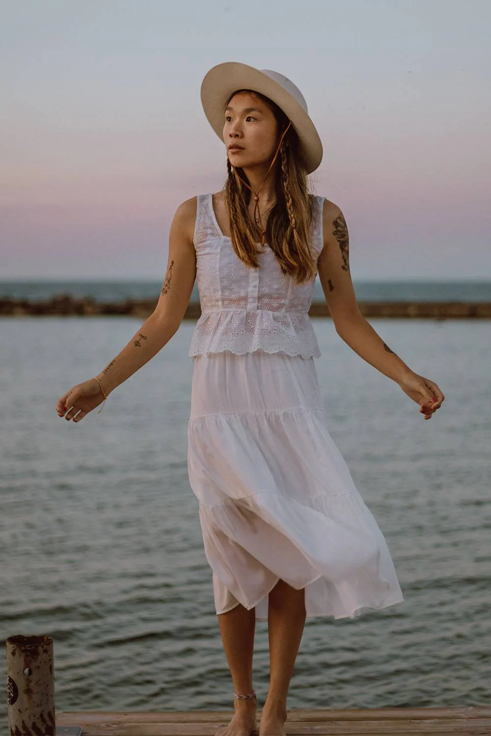 Lady on white looks good while wearing the material 