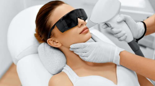 A person getting laser skin treatment

Description automatically generated