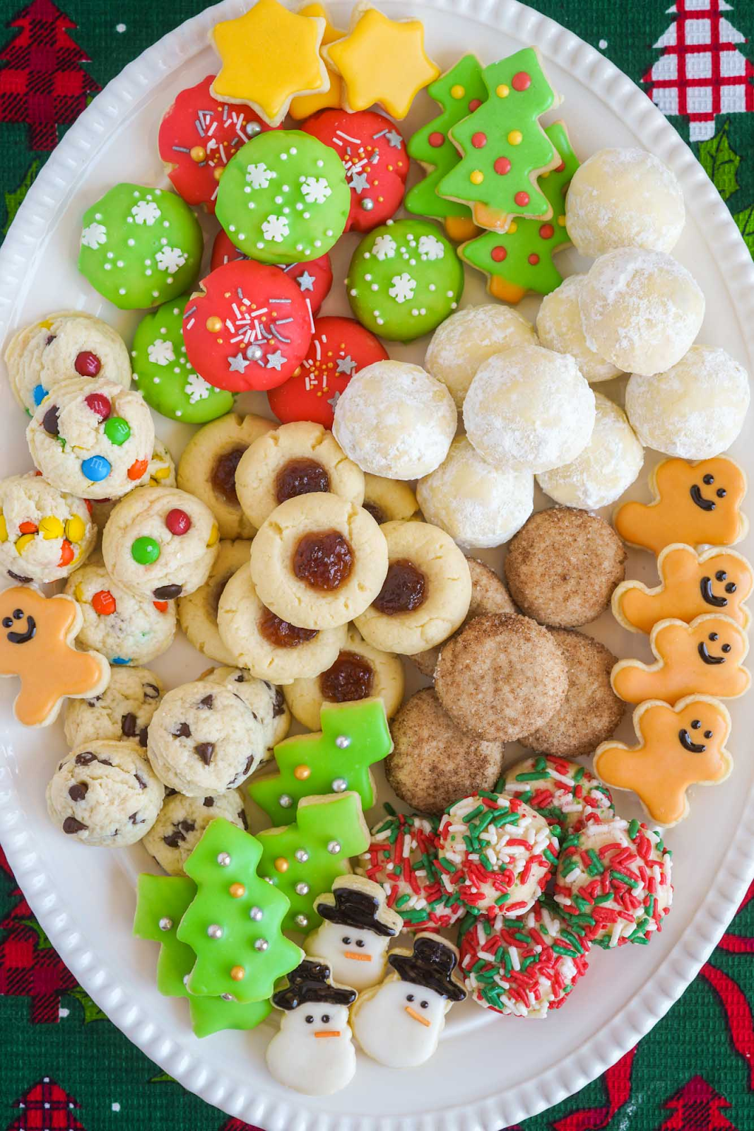 christmas cookie recipes with basic cookie dough make a variety on white plate