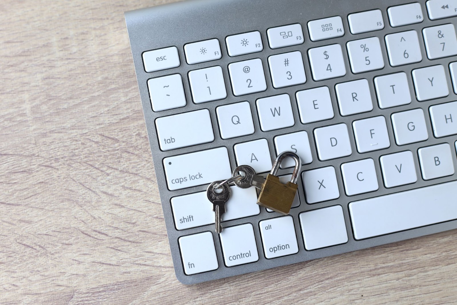  Padlock on a computer keyboard symbolizing cybersecurity risk management.