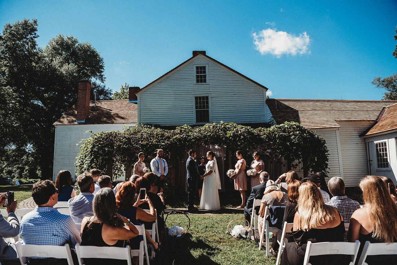 Wedding ceremony next to house