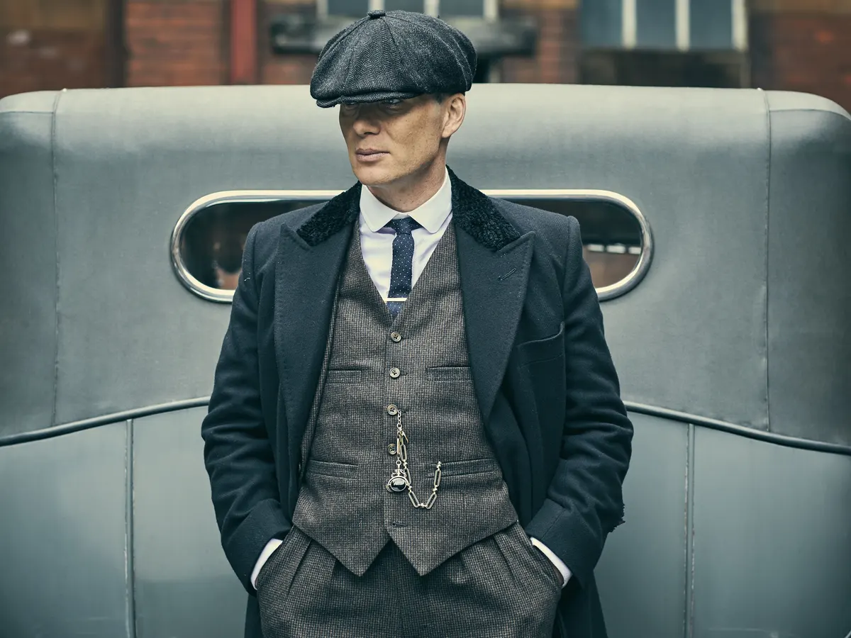 Full picture of Thomas Shelby wearing his signature hat