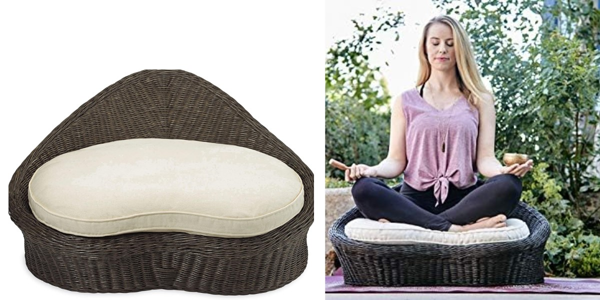 A lady meditating on Gaiam rattan meditation chair