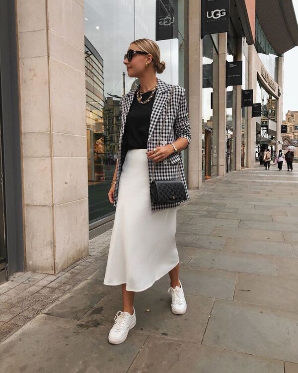 sneakers and skirt outfit spring
