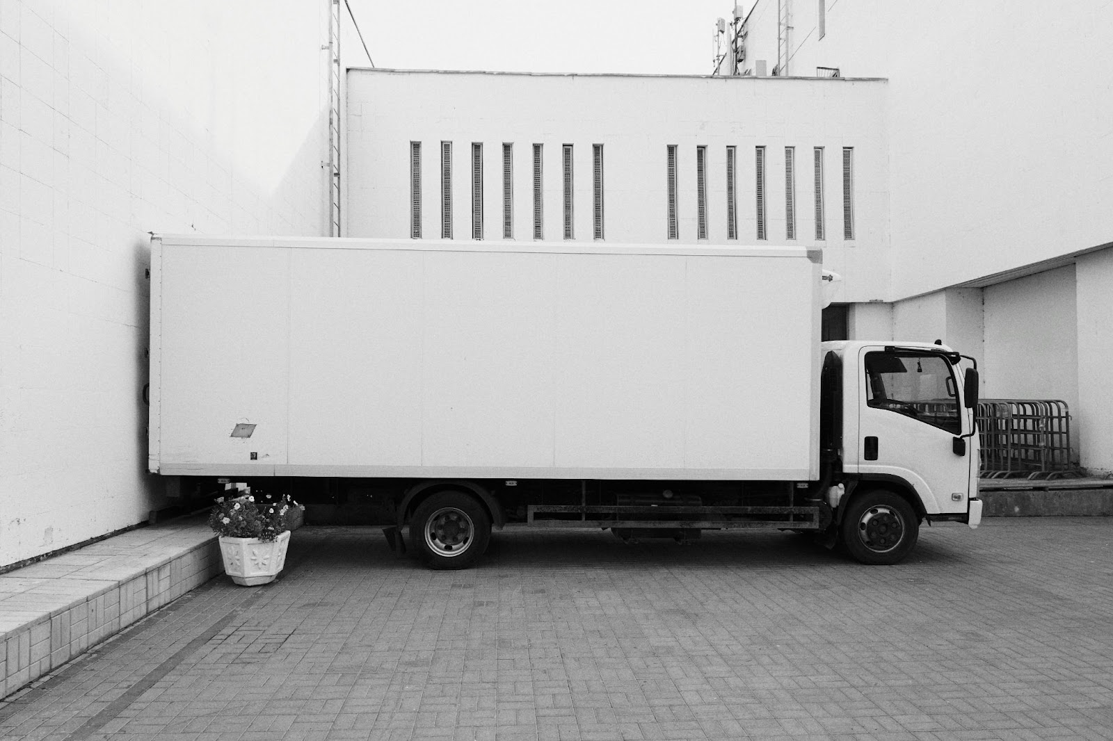 A white parked box truck