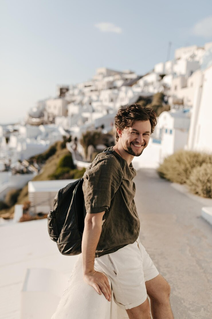 A tourist enjoying his trip tp Greece.