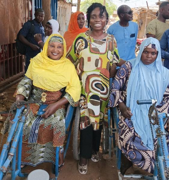 C:\Users\hp\Desktop\Evelyn\Fied visit in June July images\UGSEIN\With women's organizer for the disabled members.jpg