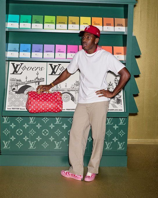 Tyler, the Creator Posing with an LV Bag