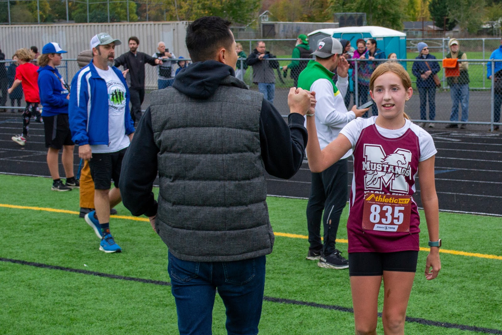 Principal-Runner Fist-Bump