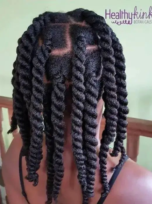 Back view of a lady rocking the Two-strand twist