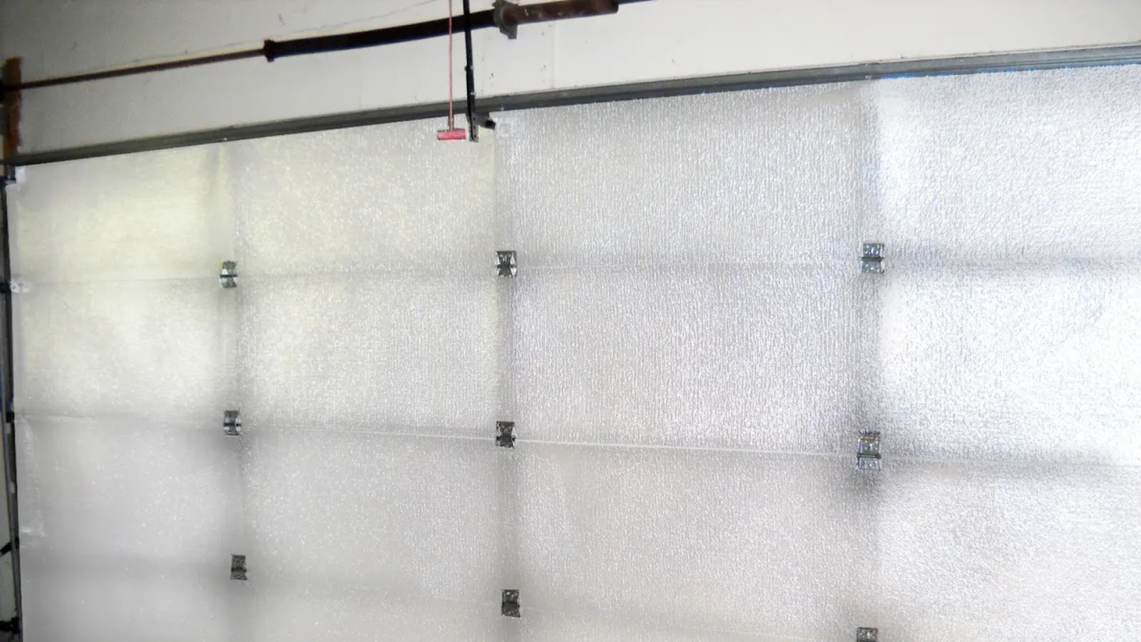 Insulating the garage door is one way to create an energy-efficient garage
