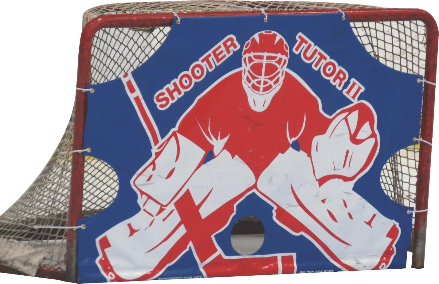 A hockey goalie with a net

Description automatically generated