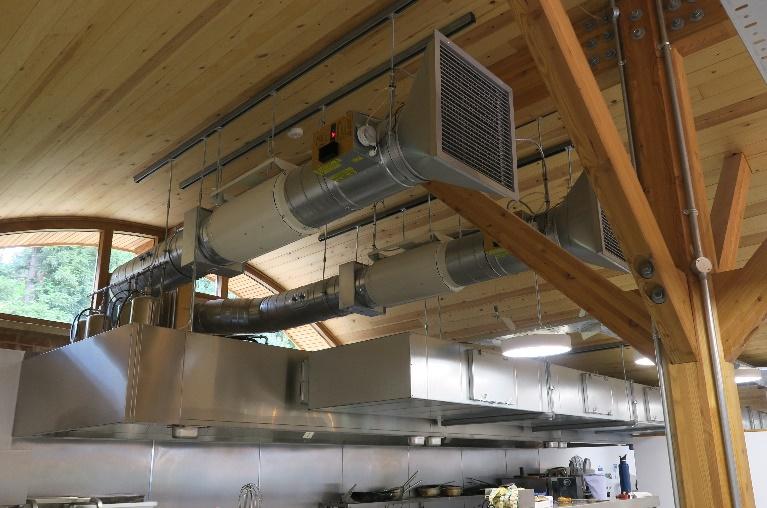 A large ventilation system in a kitchen

Description automatically generated
