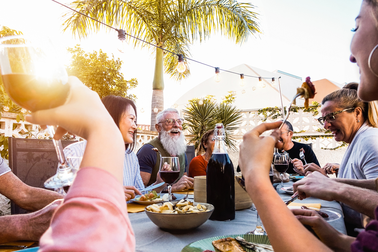 senior friends eating together