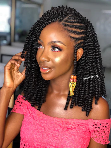 Picture showing a lady rocking Spring Curls With Side Cornrows