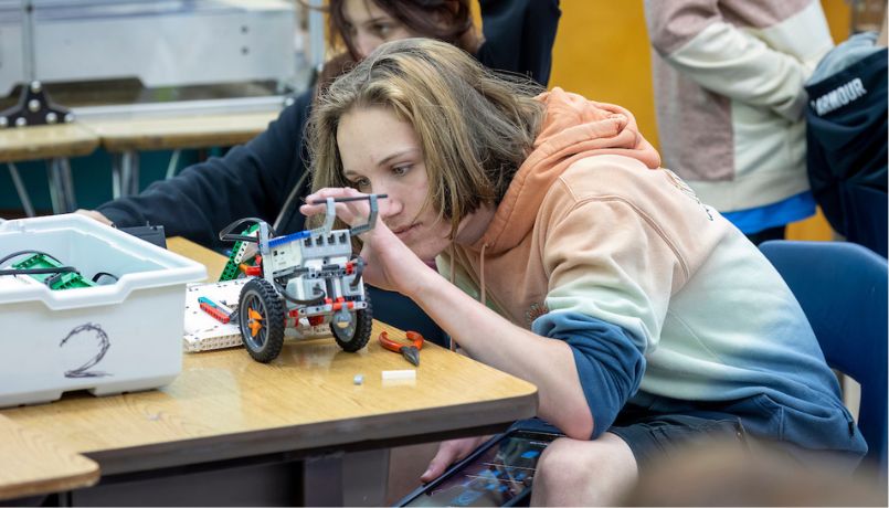 Student working on robotic vehicle