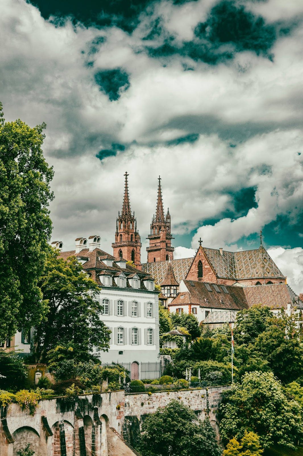 A panoramic shot of Basel Minster against the city skyline.