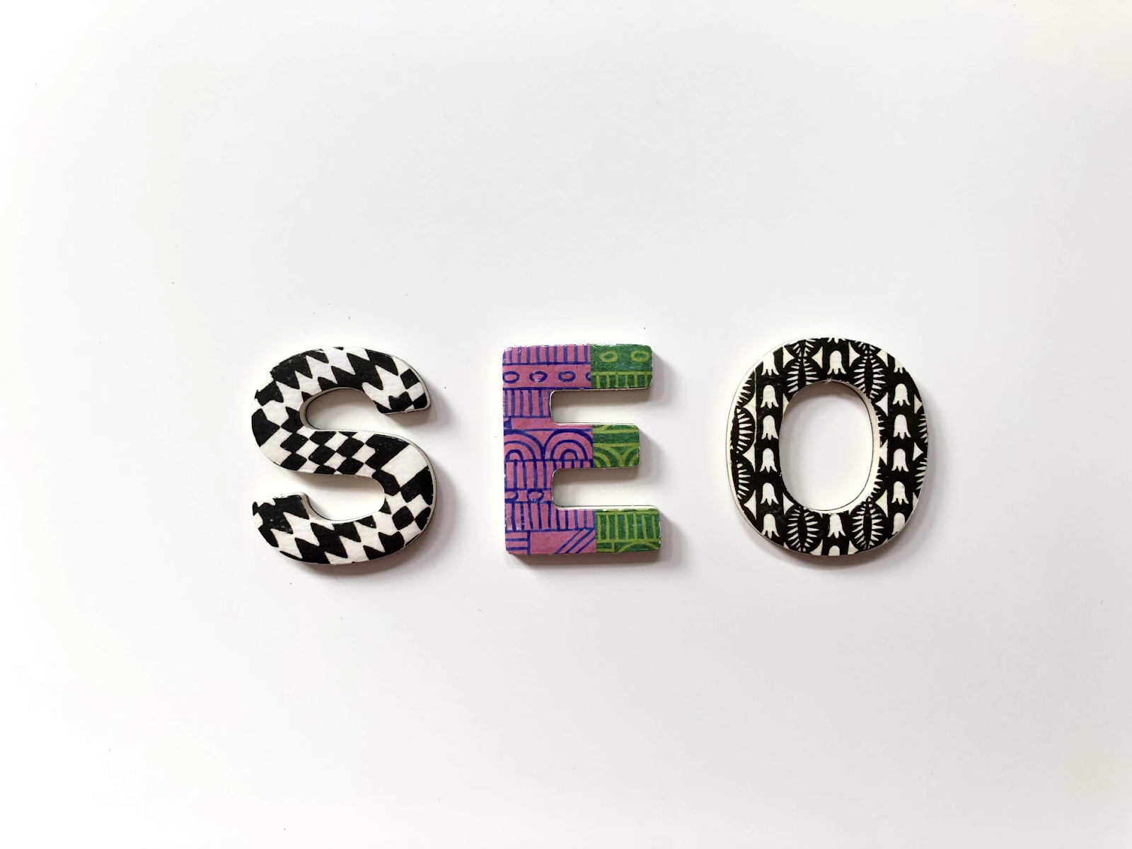 SEO spelled out with letters on a white background