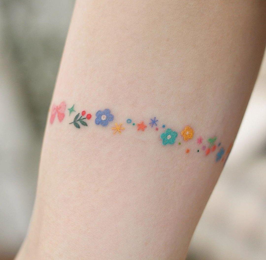 Minimalist Tattoo is The New Black - FashionActivation | Minimalist tattoo,  Rainbow tattoos, Simplistic tattoos