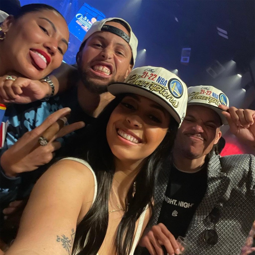 Ayesha and Steph Curry (left) commemorate the Warriors' NBA championship title with Sydel Curry and Damion Lee on Thursday.