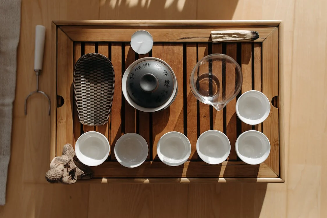 Tea meditation teaware on a bamboo stand