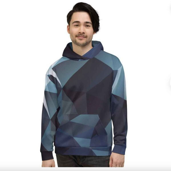 foto de un hombre que llevaba una sudadera con capucha con un diseño estampado geométrico