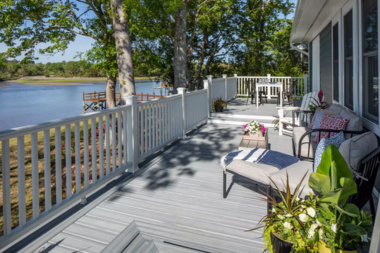 how to compare composite deck builders outdoor living space overlooking lake custom built michigan