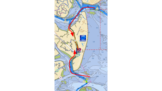 A map of Jekyll Island, showing how tide flows around the island from both the north and south ends, meeting at the tidal node.  There are arrows to show how the tide flows.