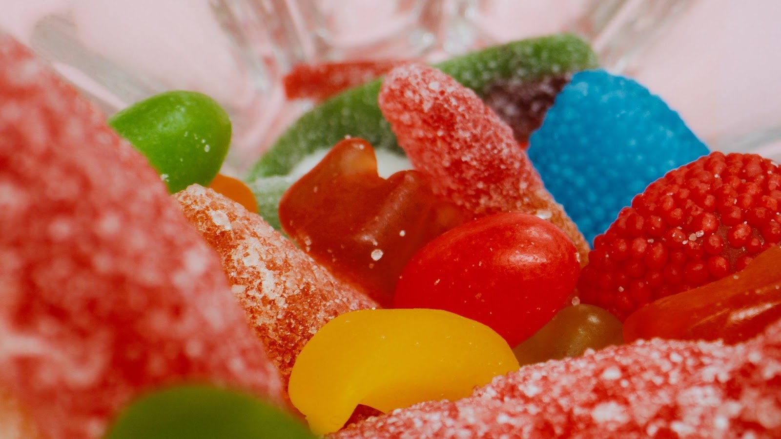 a close-up view of gummies in a glass