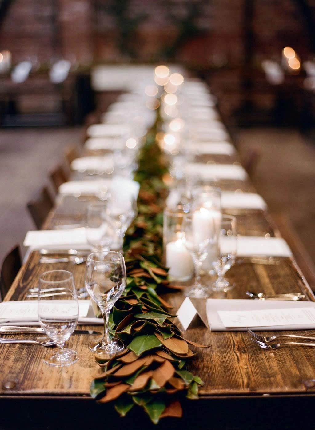 Overview of long table with leaf decor in the middle