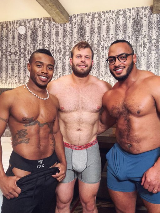 Jake Waters standing in born to fuck briefs with gay porn actor Dillon Diaz and Onlyfans content creator muscledadddyxxx