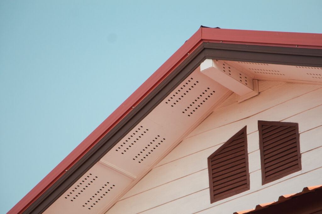 Types of Roof Vents - House roof and ceiling,with blue sky, ventilation on a house.
