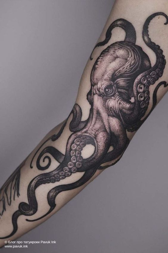 Picture of the octopus tattoo design on the arm of a guy