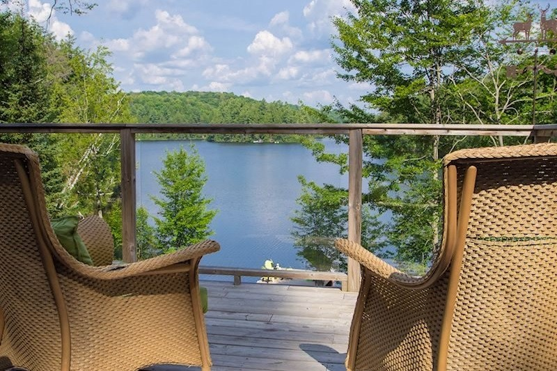 View from a cottage deck over Ril Lake, one of the best lakes in Muskoka, Ontario