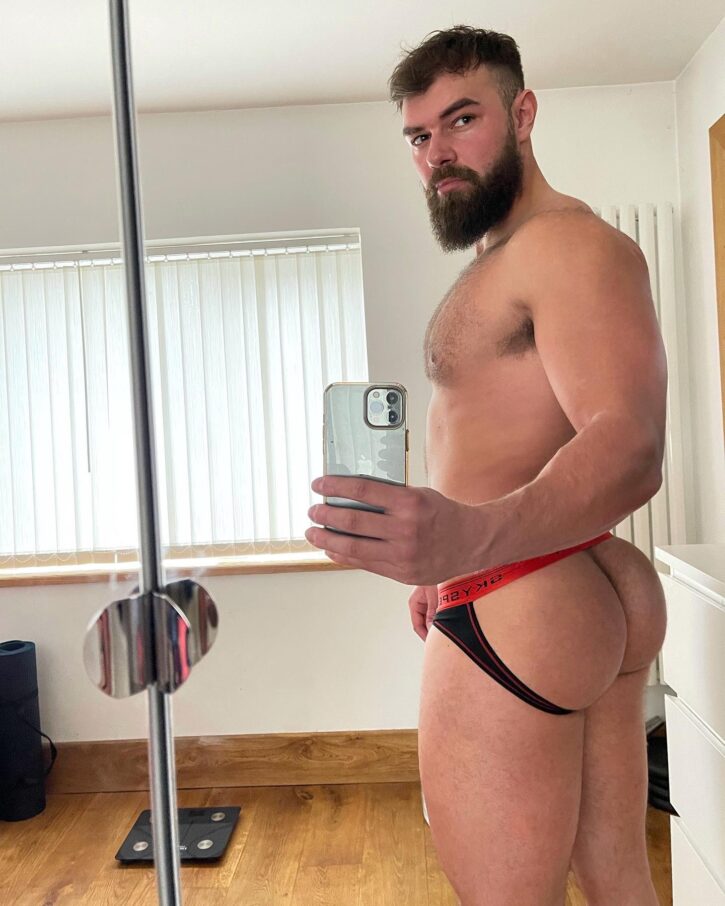 alpha bayton wearing a jockstrap showing off his bubble butt in an iphone mirror selfie