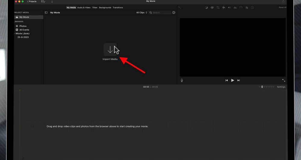 A down arrow icon for Import Media in iMovie that you can click to import files inside the app