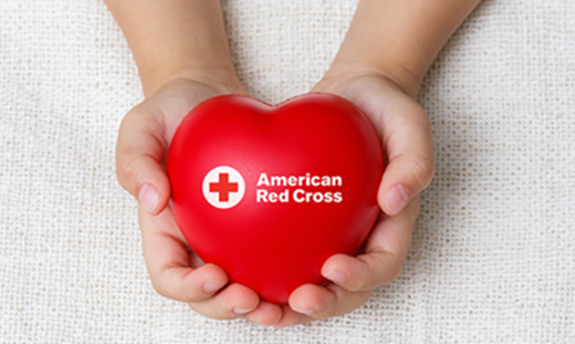 American Red Cross red heart in hands.