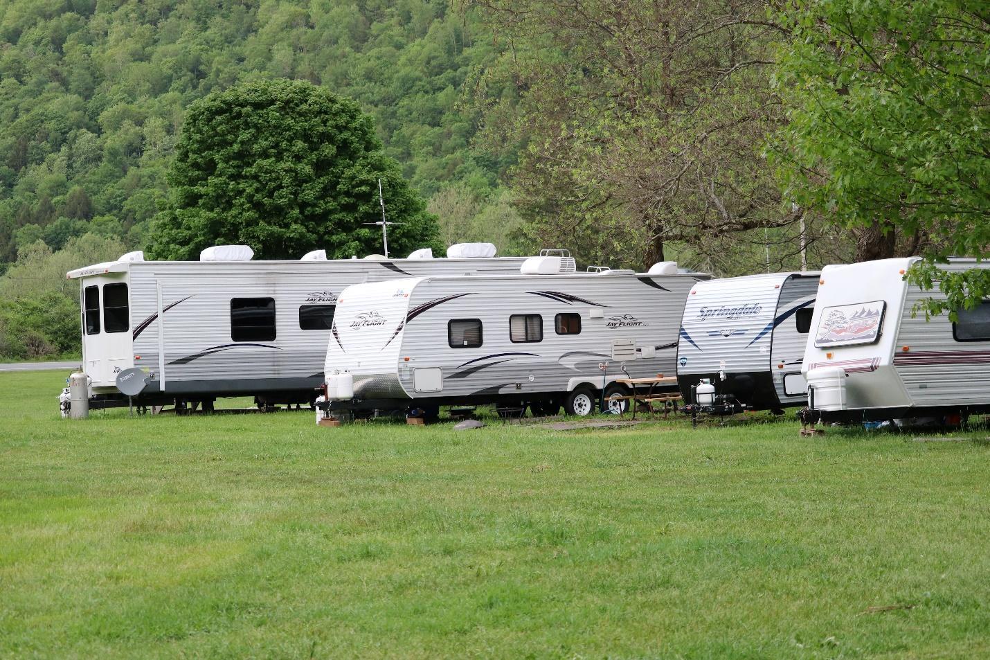 white caravans parked in the field