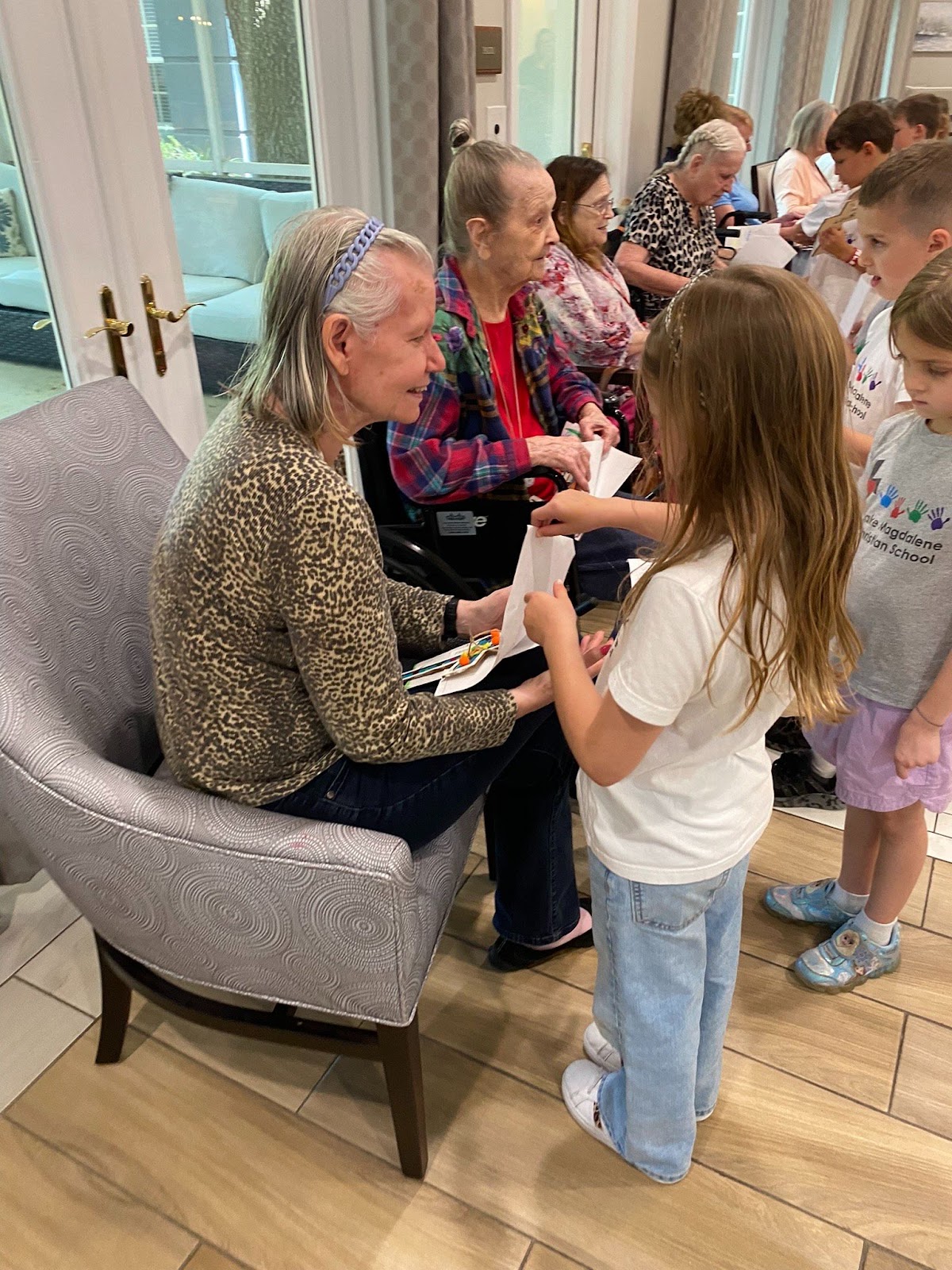 kindergarten class comes to Tampa Gardens Senior Living