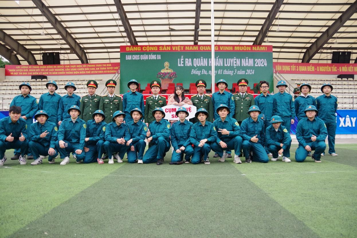 A group of people in uniform posing for a photo

Description automatically generated