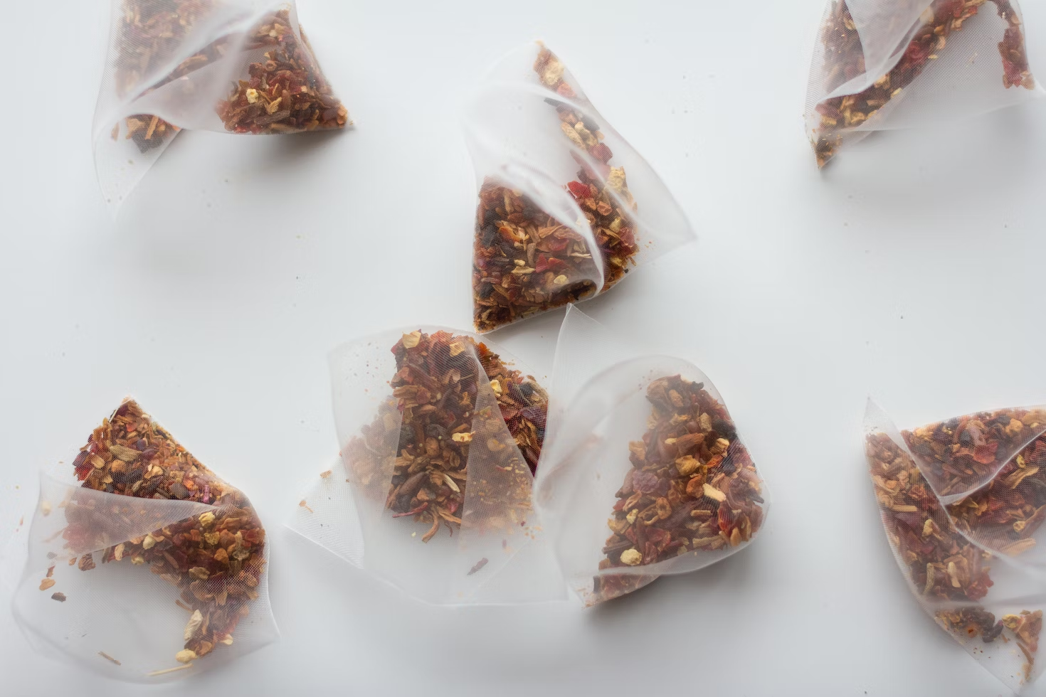 Silk pyramid tea bags with tea leaves