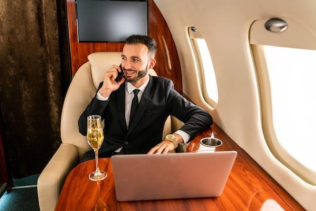 Premium Photo | Business man flying on private jet