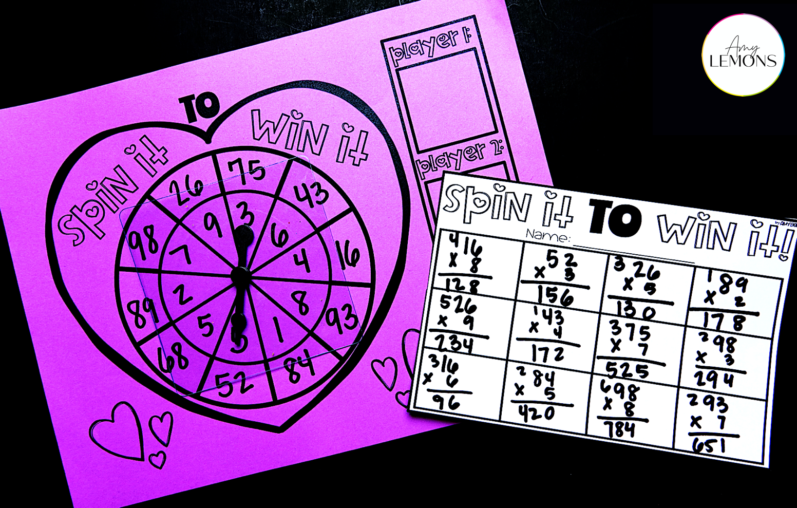 Free math game for Valentine's Day. A purple sheet with a heart number wheel and spinner students use to get two numbers for a math equation and add to a Spin it to Win it recording sheet.