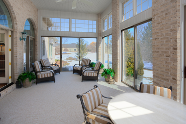 how much does a sunroom addition cost in lansing mi four season room with lounge chairs and vaulted ceiling custom built michigan