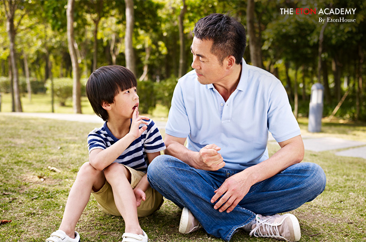 Image of a Father talking to his child